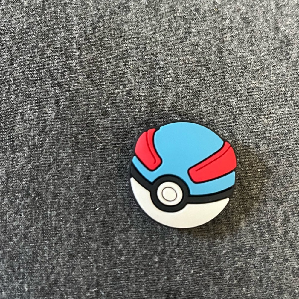 Pokémon great ball Croc Charm never used!

(Bundle for a lower price)
